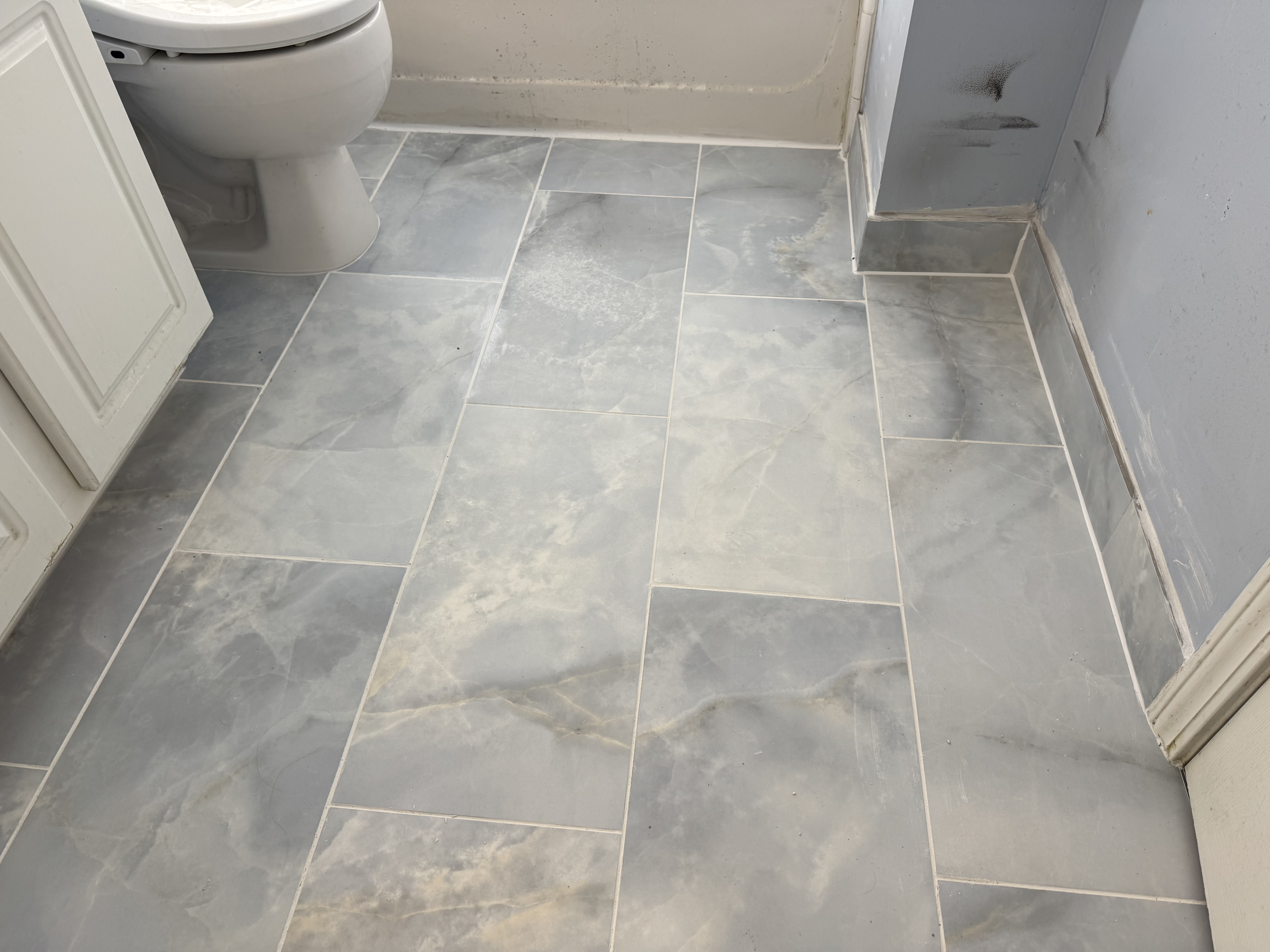 Finished floor tile installation